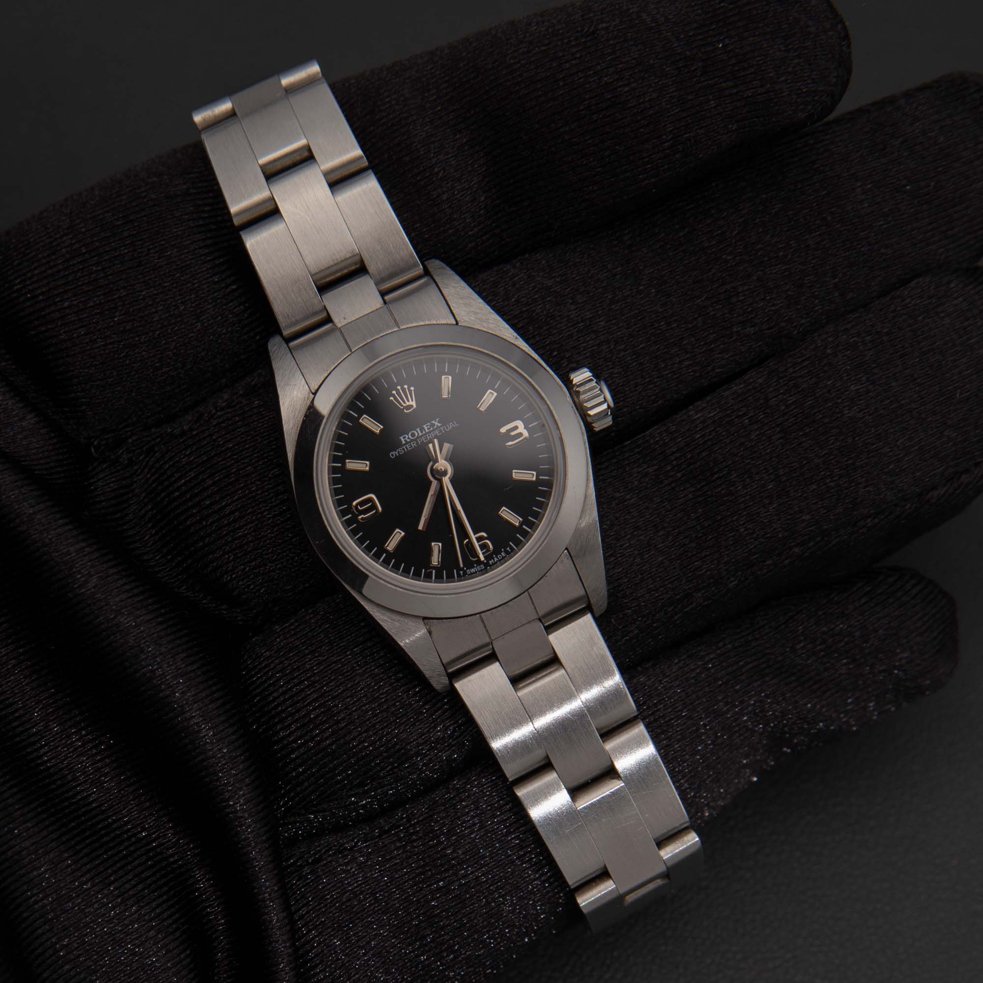 Rolex Ladies 26mm Oyster Perpetual 67180 Black Dial, Box & Paper