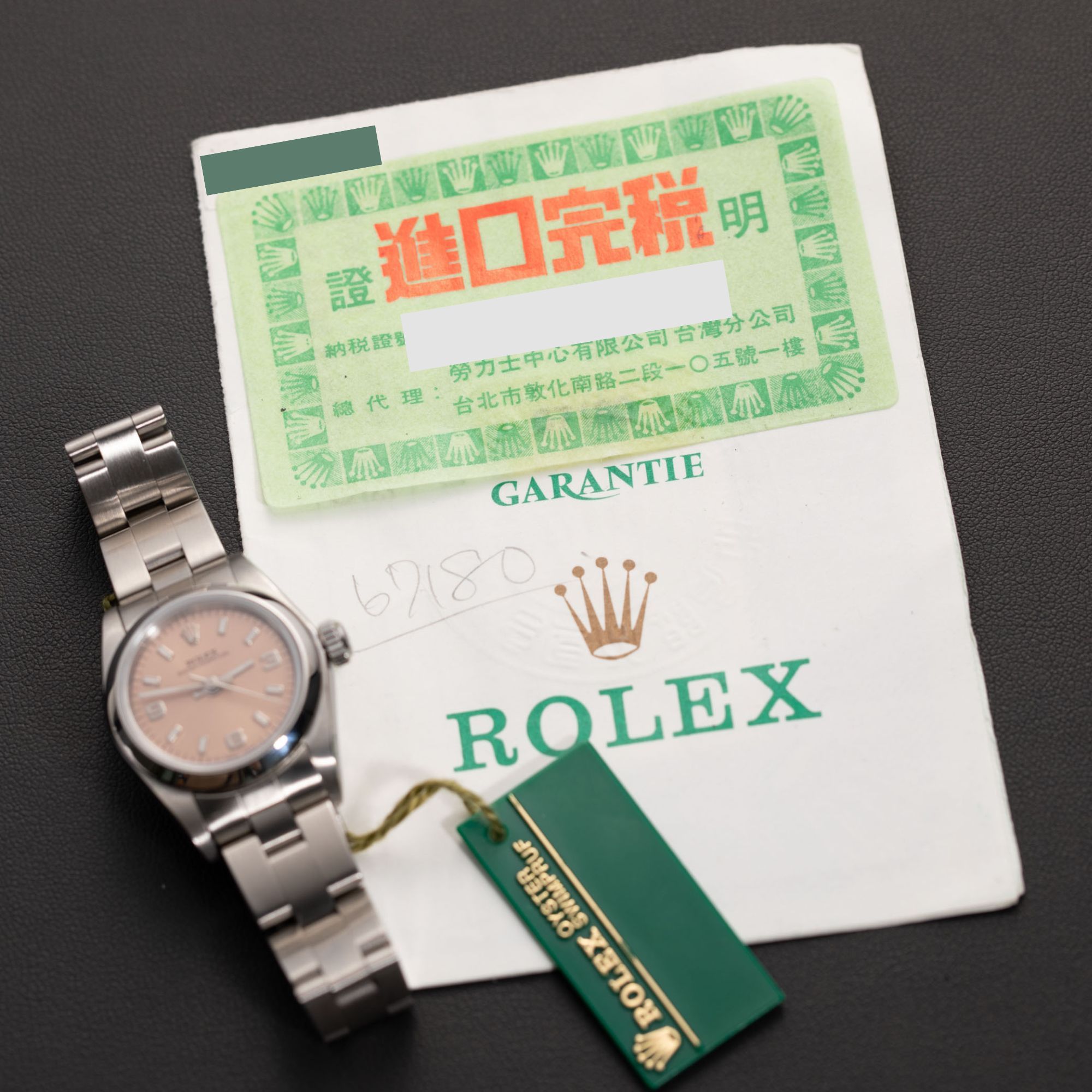 Rolex Oyster Perpetual 67180 Smooth Bezel Watch 24mm Salmon Dial